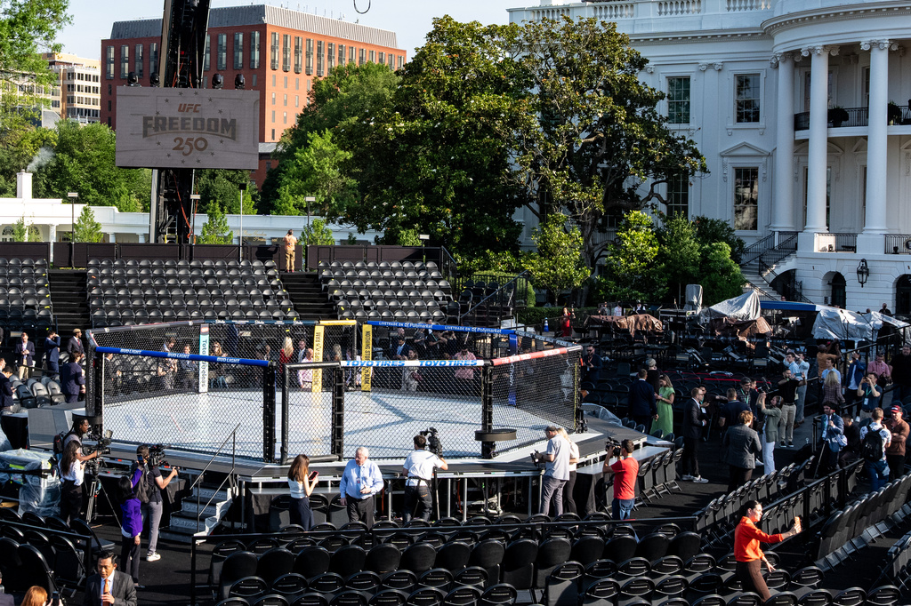 Members of the media view the arena for the UFC Freedom 250 fights on the South Lawn of the White House, Thursday, June 11, 2026, in Washington. (AP Photo/Alex Brandon)