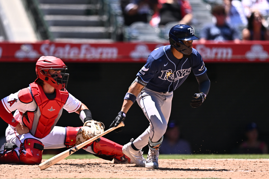 Tampa Bay Rays' Chandler Simpson hits an RBI single during the third inning of a baseball game against the Los Angeles Angels, Sunday, June 14, 2026, in Anaheim, Calif. (AP Photo/William Liang)