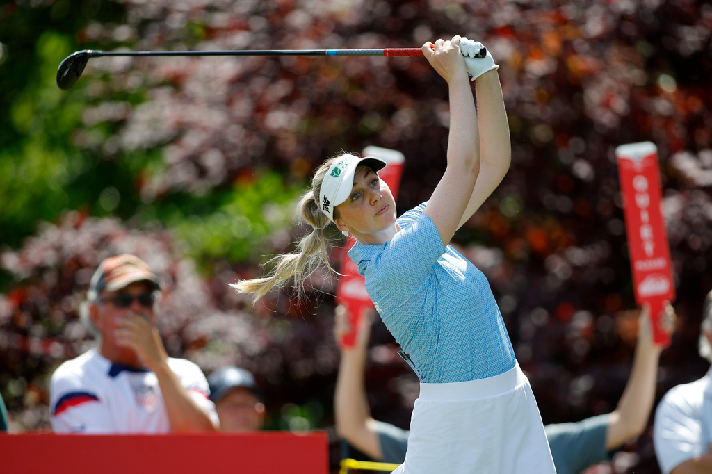Olivia Cowan, of Germany, watches her tee shot on the 17th hole during the first round of the Dow Championship LPGA golf tournament, Thursday, June 11, 2026, at Midland Country Club in Midland, Mich. (AP Photo/Al Goldis)