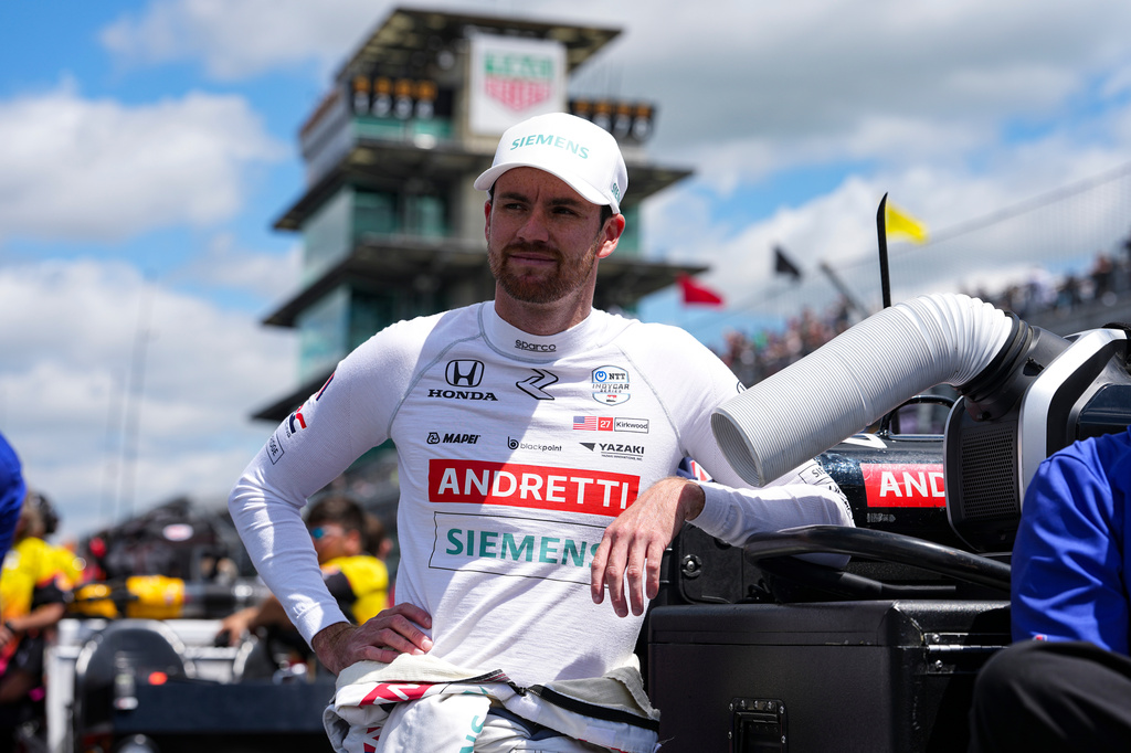 FILE - Kyle Kirkwood leans on a tool box as he waits for is turn during qualification for the Indianapolis 500 auto race at Indianapolis Motor Speedway in Indianapolis, May 17, 2025. (AP Photo/Michael Conroy, File)