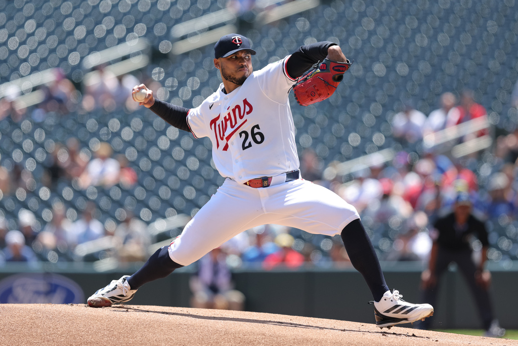 Minnesota Twins starting pitcher Taj Bradley delivers during the first inning of a baseball game against the Los Angeles Angels, Sunday, July 12, 2026, in Minneapolis. (AP Photo/Bailey Hillesheim)