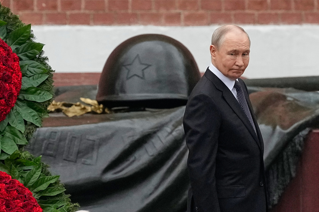 Russian President Vladimir Putin attends a wreath-laying ceremony marking the 85th anniversary of the Nazi German invasion into Soviet Union in World War II on the Remembrance and Sorrow Day at the Tomb of the Unknown Soldier by the Kremlin wall in Moscow, on Monday, June 22, 2026. (AP Photo/Alexander Zemlianichenko, Pool)