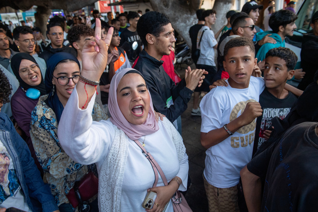Youth take part in a protest demanding healthcare and education reforms, in Rabat, Sunday, Sept. 28, 2025. (AP Photo)