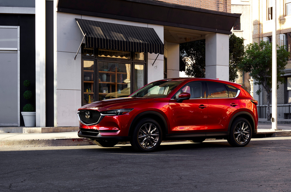 This photo provided by Mazda shows the 2021 CX-5. For 2018, the CX-5 offered standard blind-spot monitoring and rear cross-traffic alert and earned top ratings in crash testing. (Courtesy of Mazda North American Operations via AP)