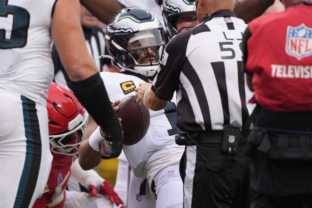 Philadelphia Eagles quarterback Jalen Hurts gets up off the turf after scoring a touchdown during the second half of an NFL football game against the Kansas City Chiefs Sunday, Sept. 14, 2025, in Kansas City, Mo. (AP Photo/Charlie Riedel)