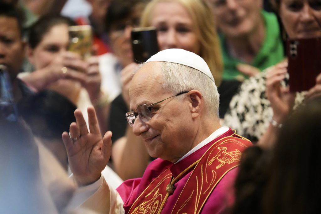 Pope Leo XIV arrives to preside over a vigil prayer for the consolation of people who suffer, in St. Peter's Square at The Vatican, Monday, Sept.15, 2025. (AP Photo/Gregorio Borgia)