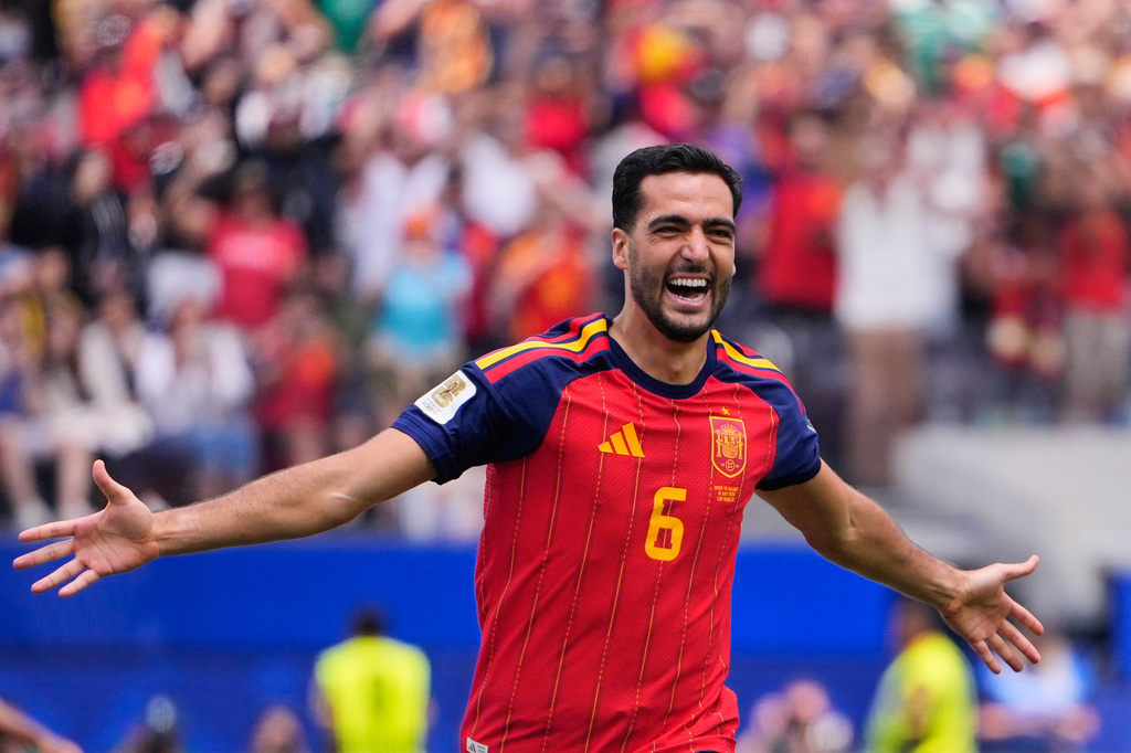 Spain's Mikel Merino (6) celebrates scoring their second goal during the World Cup quarterfinal soccer match between Spain and Belgium in Inglewood, Calif., near Los Angeles, Friday, July 10, 2026. (AP Photo/Mark J. Terrill)