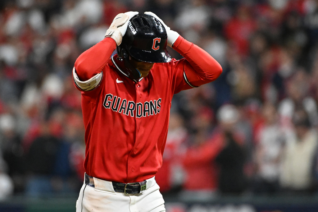Cleveland Guardians' Travis Bazzana reacts after hitting a fly out during the ninth inning of Game 2 of baseball's American League Division Series against the Chicago White Sox, Monday, Oct. 5, 2026, in Cleveland. (AP Photo/Phil Long)