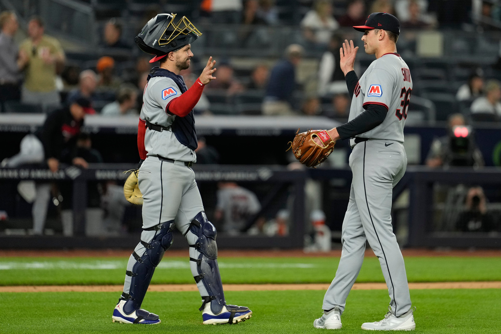 Cleveland Guardians pitcher Cade Smith, right, celebrates with catcher Patrick Bailey after a baseball game against the New York Yankees, Wednesday, June 3, 2026, in New York. (AP Photo/Seth Wenig)