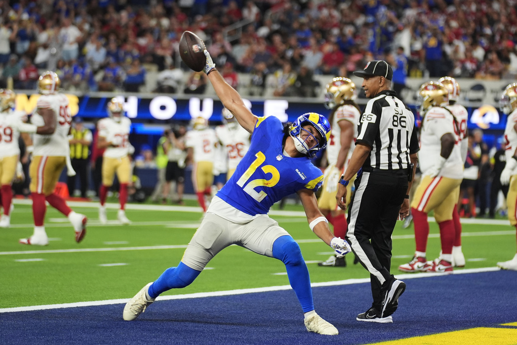 Los Angeles Rams wide receiver Puka Nacua (12) celebrates after scoring against the San Francisco 49ers during the second half of an NFL football game, Thursday, Oct. 2, 2025, in Inglewood, Calif. (AP Photo/Marcio Jose Sanchez)