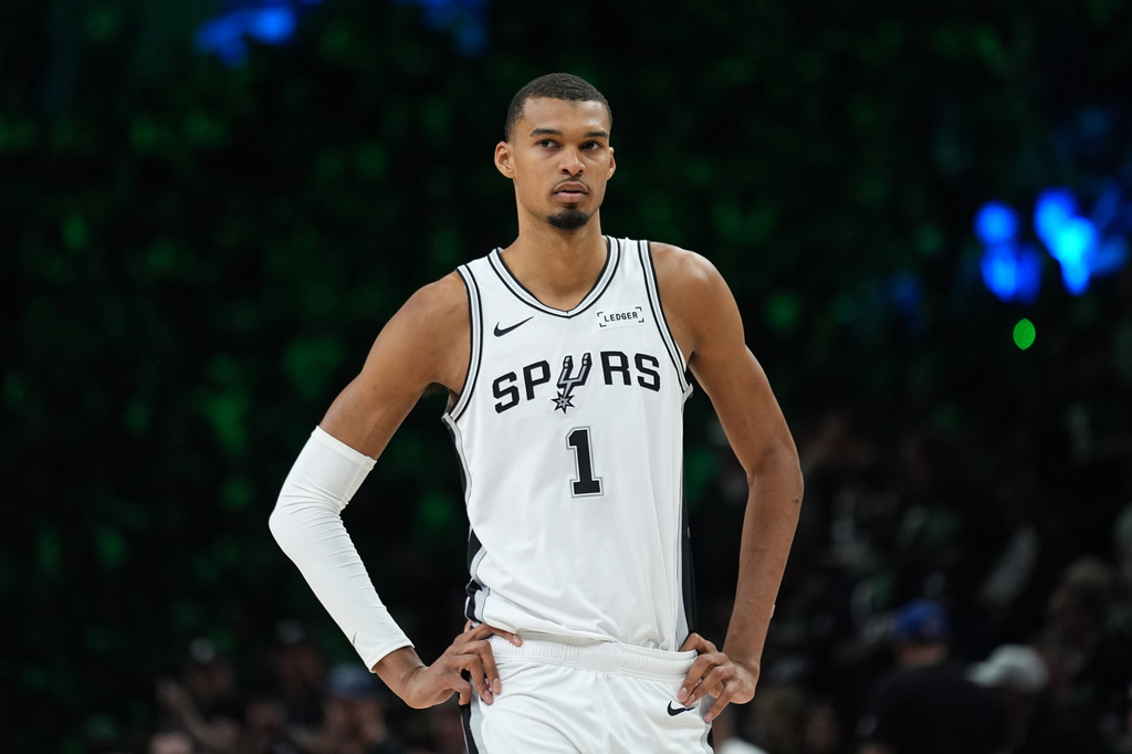 San Antonio Spurs forward Victor Wembanyama (1) waits for play to resume during the first half of Game 3 of a NBA basketball second-round playoff series against the Minnesota Timberwolves in Minneapolis, Friday, May 8, 2026. (AP Photo/Abbie Parr)