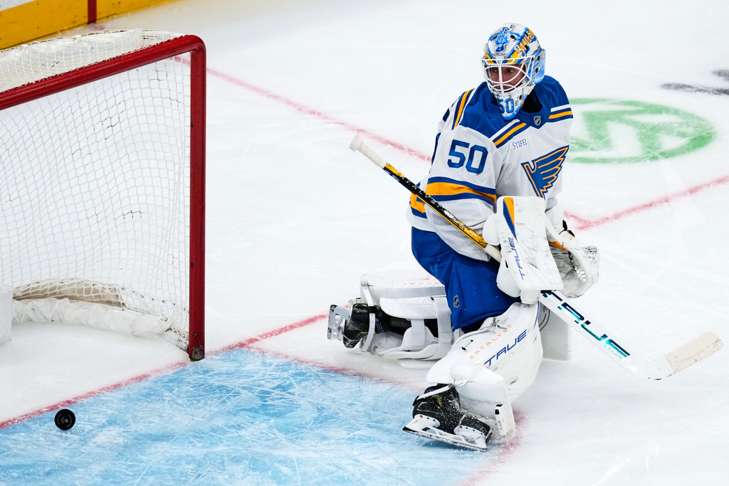 St. Louis Blues goaltender Jordan Binnington looks back at the puck on a goal by Boston Bruins left wing Viktor Arvidsson during the second period of an NHL hockey game, Thursday, Dec. 4, 2025, in Boston. (AP Photo/Charles Krupa)