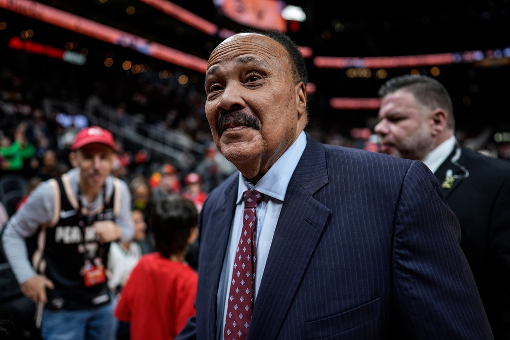 Martin Luther King III leaves the court during the second half of an NBA basketball game between the Atlanta Hawks and the Milwaukee Bucks, Monday, Jan. 19, 2026, in Atlanta. (AP Photo/Mike Stewart)