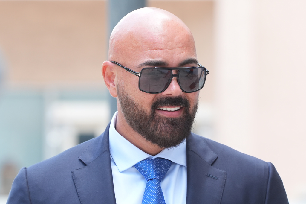 Attorney Joseph McBride arrives for a court hearing for his clients Andrew and Tristan Tate after they were arrested to face rape and sex trafficking charges against them in the United Kingdom, Monday, July 20, 2026, in Miami. (AP Photo/Marta Lavandier)