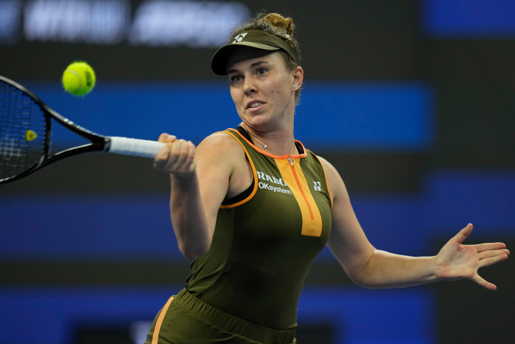 Linda Noskova of the Czech Republic returns the ball from Amanda Anisimova of the United States in the women's singles final match of the China Open tennis tournament in Beijing, China, Sunday, Oct. 5, 2025.(AP Photo/Ng Han Guan)