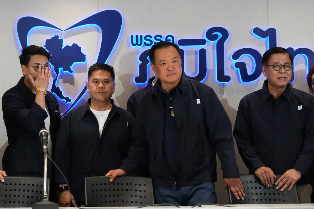 Thailand's Prime Minister and leader of Bhumjaithai Party Anutin Charnvirakul, center, speaks during a press conference at the party headquarters following the general election in Bangkok, Sunday, Feb. 8, 2026. (AP Photo/Sakchai Lalit)