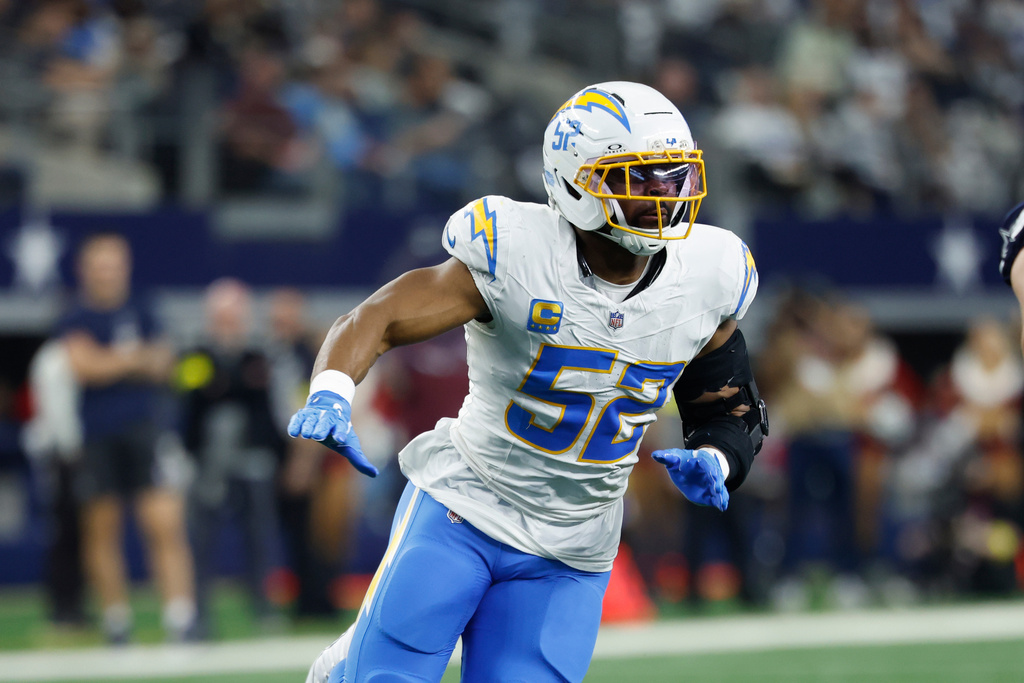 FILE -Los Angeles Chargers linebacker Khalil Mack (52) rushes during a NFL football game against the Dallas Cowboys on Sunday, Dec. 21, 2025, in Arlington, Texas. (AP Photo/Matt Patterson, File)