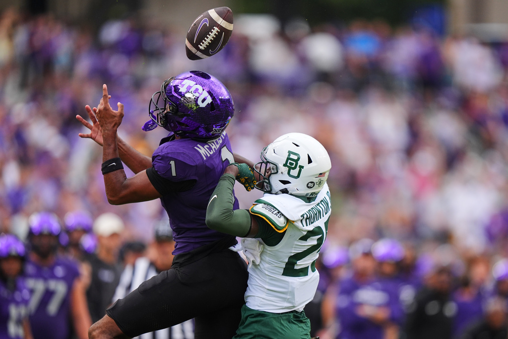 Baylor cornerback Levar Thornton Jr. (25) breaks up a pass intended for TCU wide receiver Eric McAlister (1) during the first half of an NCAA college football game, Saturday, Oct. 18, 2025, in Fort Worth, Texas. (AP Photo/LM Otero)