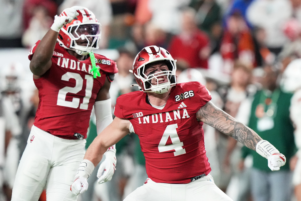 Indiana linebacker Aiden Fisher celebrates after sacking Miami quarterback Carson Beck during the first half of the College Football Playoff national championship game, Monday, Jan. 19, 2026, in Miami Gardens, Fla. (AP Photo/Marta Lavandier)