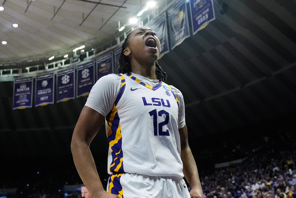 LSU guard Mikaylah Williams (12) reacts during the first half in the first round of the NCAA college basketball tournament against Jacksonville, Friday, March 20, 2026, in Baton Rouge, La. (AP Photo/Gerald Herbert)