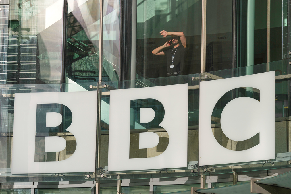 FILE - The BBC logo is displayed outside the company's headquarters in London, Nov. 12, 2025. (AP Photo/Kin Cheung, File)