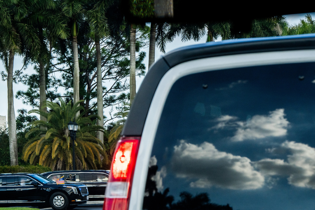 President Donald Trump departs Trump International Golf Club in the presidential limousine, known as The Beast, Sunday, Jan. 11, 2026, in West Palm Beach, Fla. (AP Photo/Julia Demaree Nikhinson)