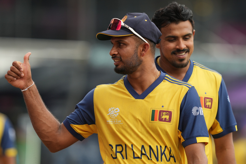 Sri Lanka's captain Dasun Shanaka gives thumbs up to a fan during the T20 World Cup cricket match between Sri Lanka and Zimbabwe in Colombo, Sri Lanka, Thursday, Feb. 19, 2026. (AP Photo/Eranga Jayawardena)
