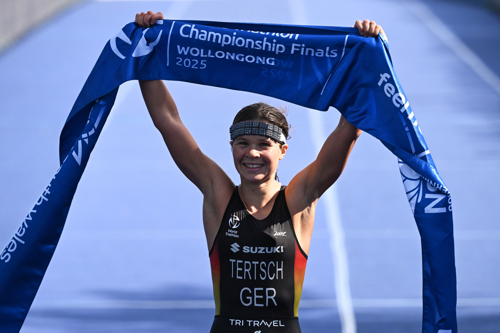 Lisa Tertsch of Germany reacts as she wins the Elite Women's final at the World Triathlon Championships in Wollongong, Australia, Sunday, Oct. 19, 2025. (Dean Lewins/AAPImage via AP)