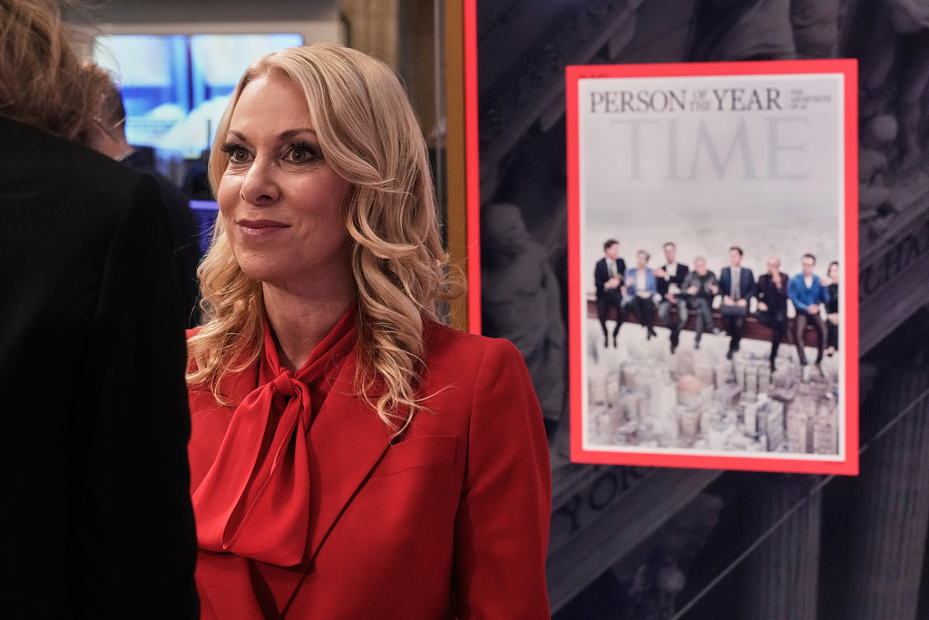 TIME CEO Jessica Sibley is interviewed on the floor of the New York Stock Exchange, adjacent to TIME's "Person of the Year" cover, Thursday, Dec. 11, 2025. (AP Photo/Richard Drew)