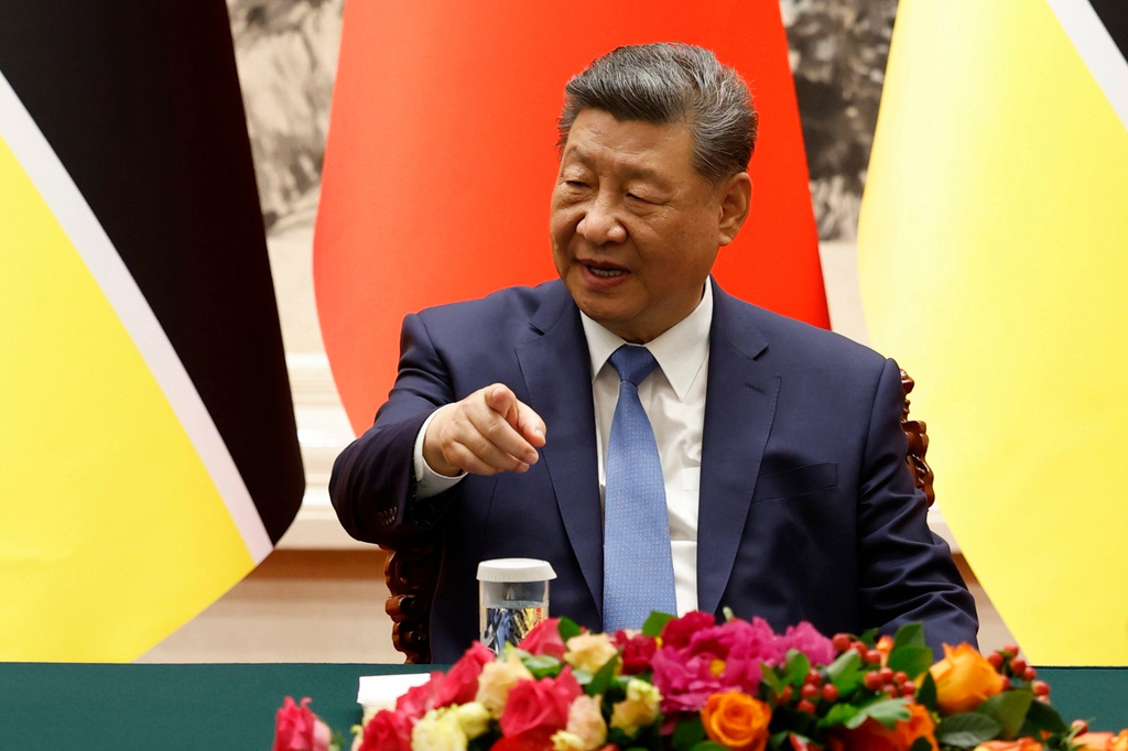 China's President Xi Jinping attend a signing ceremony with Mozambique's President Daniel Chapo, not pictured, at the Great Hall of the People in Beijing Tuesday, April 21, 2026. (Haruna Furuhashi/Pool Photo via AP)