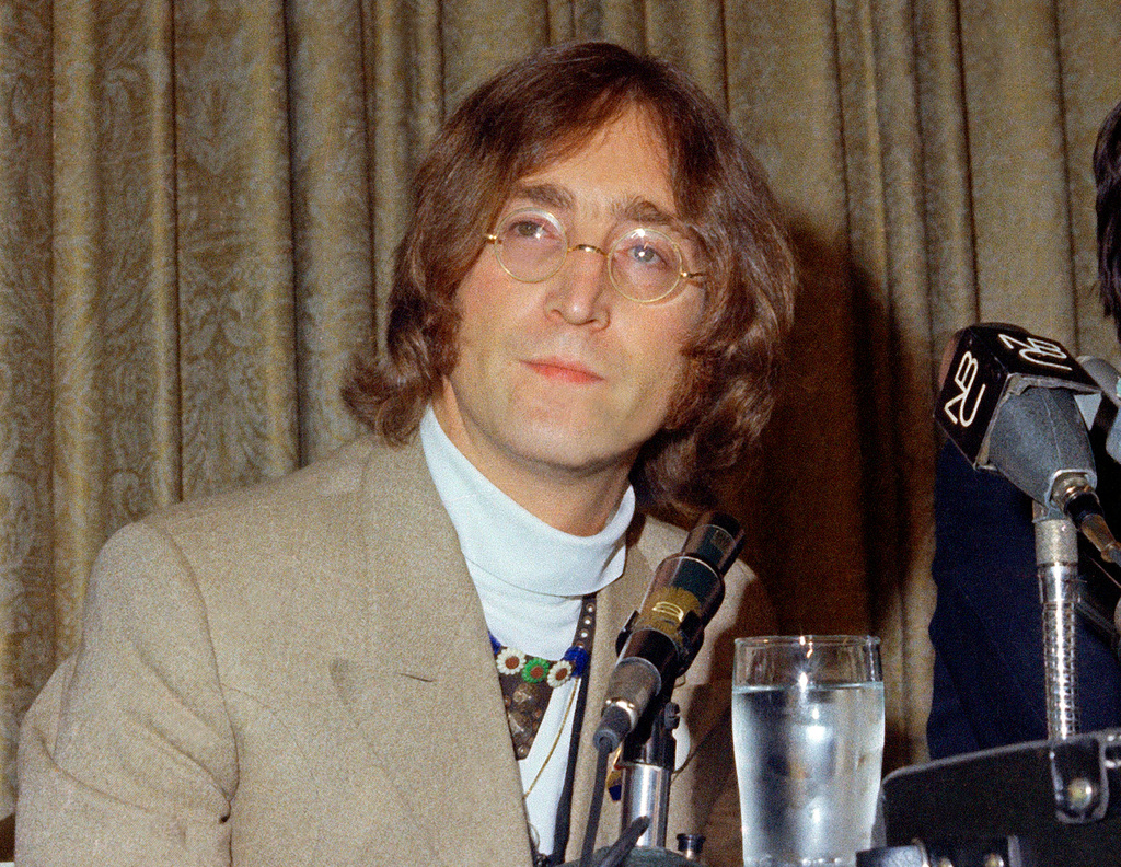 FILE - In this May 13, 1968 file photo, singer John Lennon appears during a press conference at the Hotel Americana in New York. (AP Photo, File)