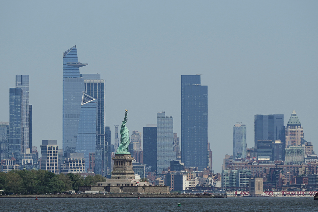 FILE - The New York skyline and Statue of Liberty are seen on May 12, 2025. (AP Photo/Matt Rourke, File)
