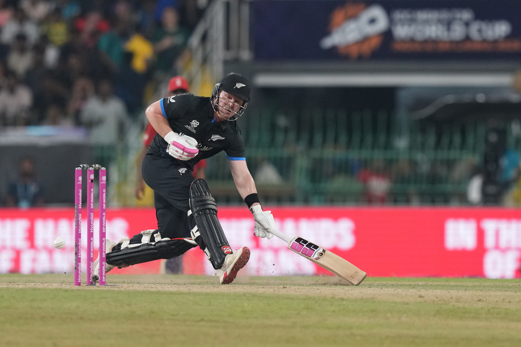 New Zealand's Tim Seifert make it successfully to the crease during the T20 World Cup cricket match between England and New Zealand in Colombo, Sri Lanka, Friday, Feb. 27, 2026. (AP Photo/Eranga Jayawardena)