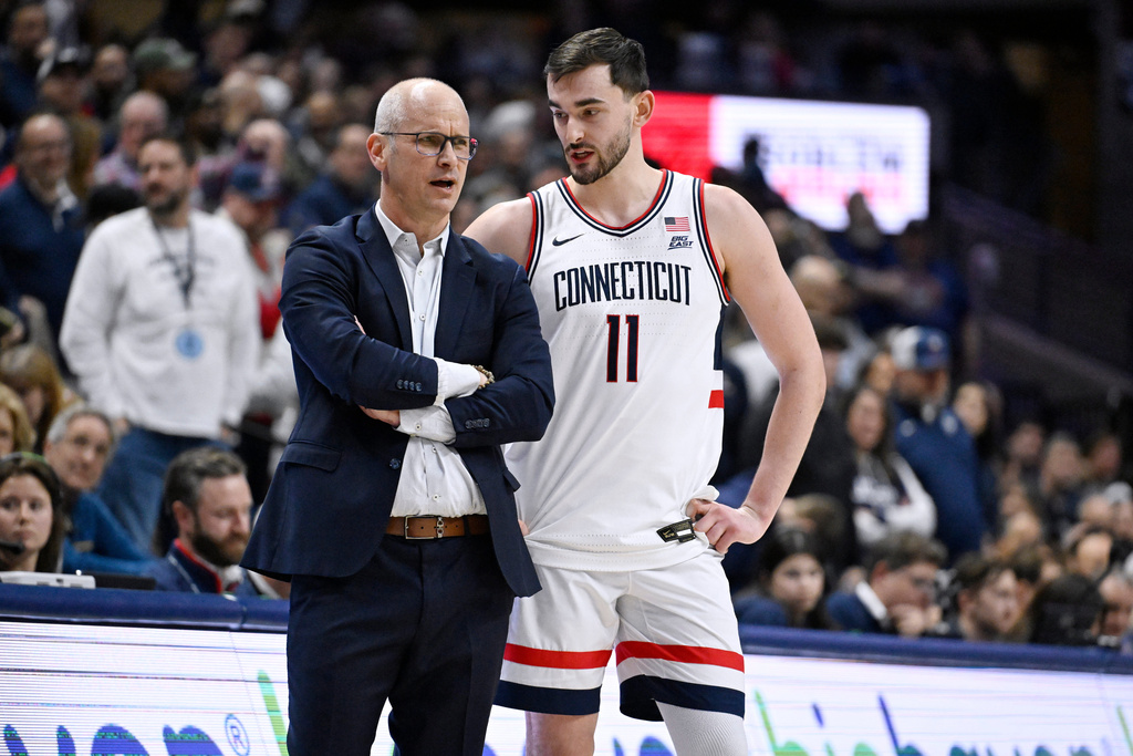 UConn head coach Dan Hurley talks with UConn forward Alex Karaban (11) in the second half of an NCAA college basketball game, Saturday, Feb. 14, 2026, in Storrs, Conn. (AP Photo/Jessica Hill)