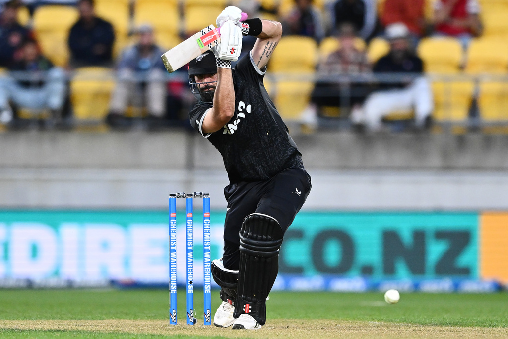Daryl Mitchell of New Zealand bats during the One Day International cricket match between New Zealand and England in Wellington, New Zealand, Saturday, Nov. 1, 2025. (Kerry Marshall/Photosport via AP)
