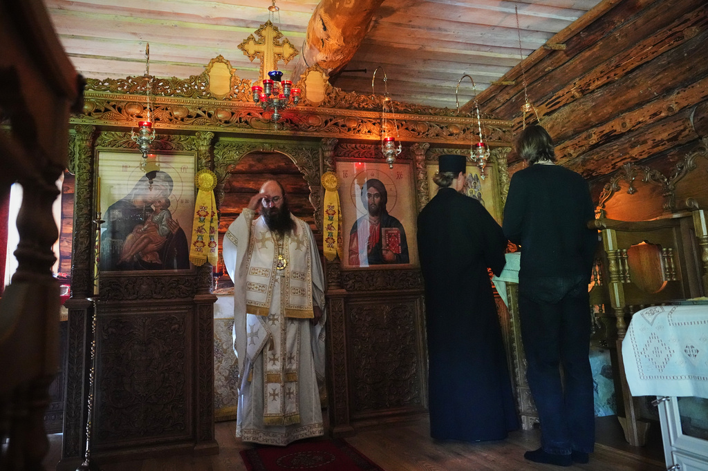 Estonia Monastery Bishop Damaskinos, centre left, prays during the Divine Liturgy in the chapel of the newly founded Kirikla Orthodox Monastery in Pihali village, Estonia, on July 4, 2026. (AP Photo/Sergei Grits)