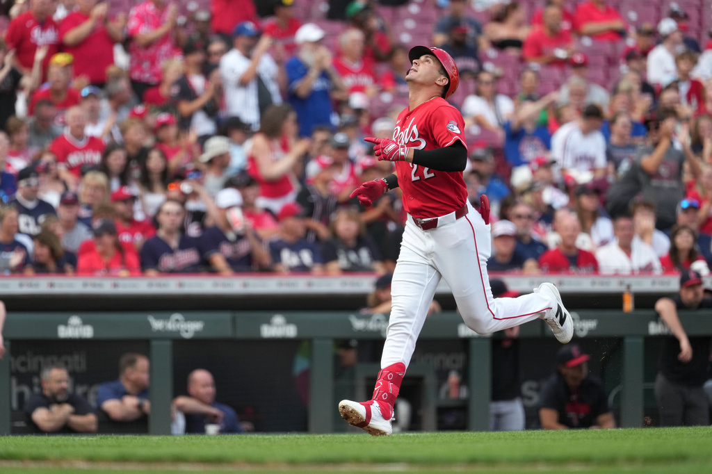 Cincinnati Reds' JJ Bleday celebrates a solo home run as he approaches home plate during the first inning in the second baseball game of a doubleheader against the Cleveland Guardians, Tuesday, July 28, 2026, in Cincinnati. (AP Photo/Kareem Elgazzar)