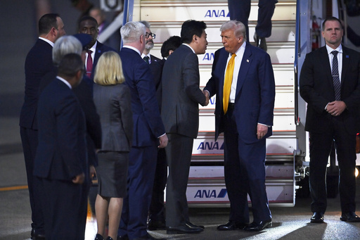 President Donald Trump is welcomed by Japan's newly appointed Chief Cabinet Secretary Minoru Kihara upon arrival at Haneda Tokyo International Airport in Tokyo, Japan, Monday, Oct. 27, 2025, (David Mareuil/Pool Photo via AP) President Donald Trump is welcomed by Japan's newly appointed Chief Cabinet Secretary Minoru Kihara upon arrival at Haneda Tokyo International Airport in Tokyo, Japan, Monday, Oct. 27, 2025, (David Mareuil/Pool Photo via AP)