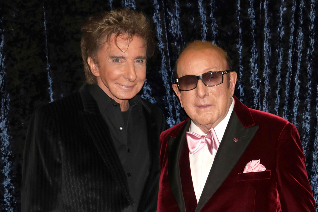 FILE - Barry Manilow, left, and Clive Davis attend Clive Davis' 90th birthday celebration in New York on April 6, 2022. (Photo by Greg Allen/Invision/AP, File)