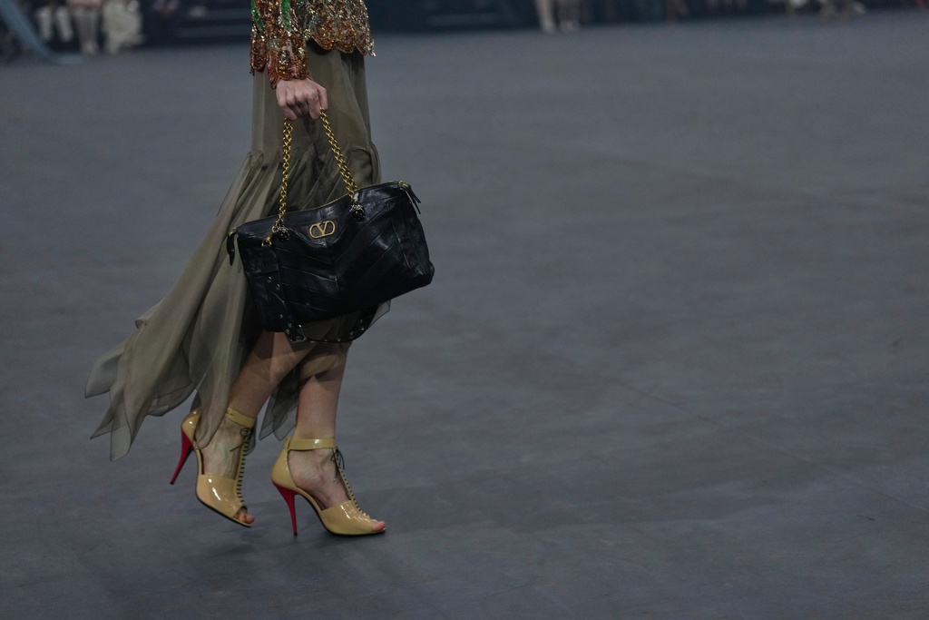 A model wears a creation as part of the Valentino Spring/Summer 2026 collection presented in Paris, Sunday, Oct. 5, 2025. (AP Photo/Aurelien Morissard)