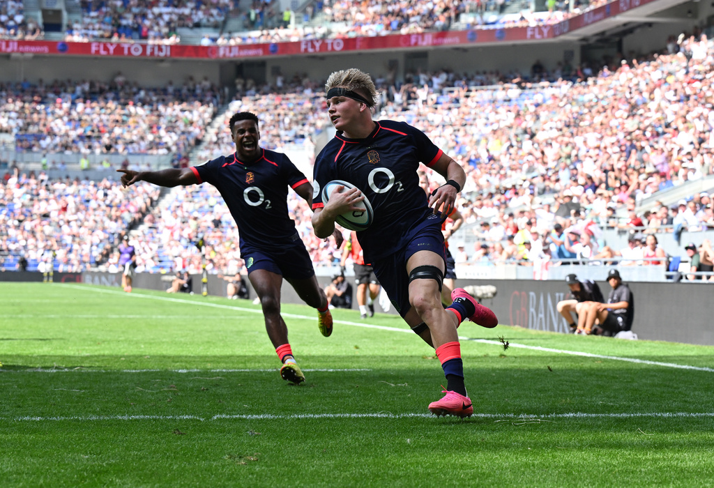 England's Henry Pollock scores a try during the Nations Championship rugby match between England and Fiji in Liverpool, England, Saturday, July 11, 2026. (Bruce Rollinson/PA via AP)