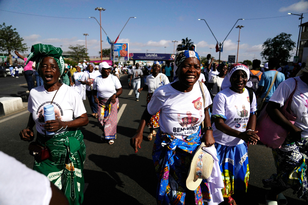 Wellwishers welcome Pope Leo XIV as he arrives in Luanda, Angola, Saturday, April 18, 2026 on the sixth day of his 11-day pastoral visit to Africa. (AP Photo/Themba Hadebe)