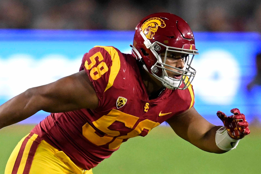 FILE - Southern California defensive end Solomon Tuliaupupu (58) plays against Fresno State during an NCAA football game, Sept. 17, 2022, in Los Angeles. (AP Photo/John McCoy, File)