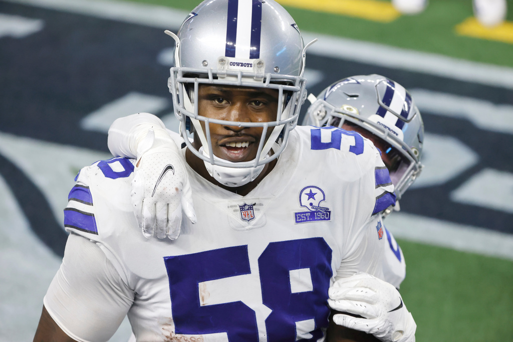 FILE - Dallas Cowboys defensive end Aldon Smith (58) celebrates a play against the Pittsburgh Steelers in an NFL football game in Arlington, Texas, Sunday, Nov. 8, 2020. (AP Photo/Ron Jenkins, File)
