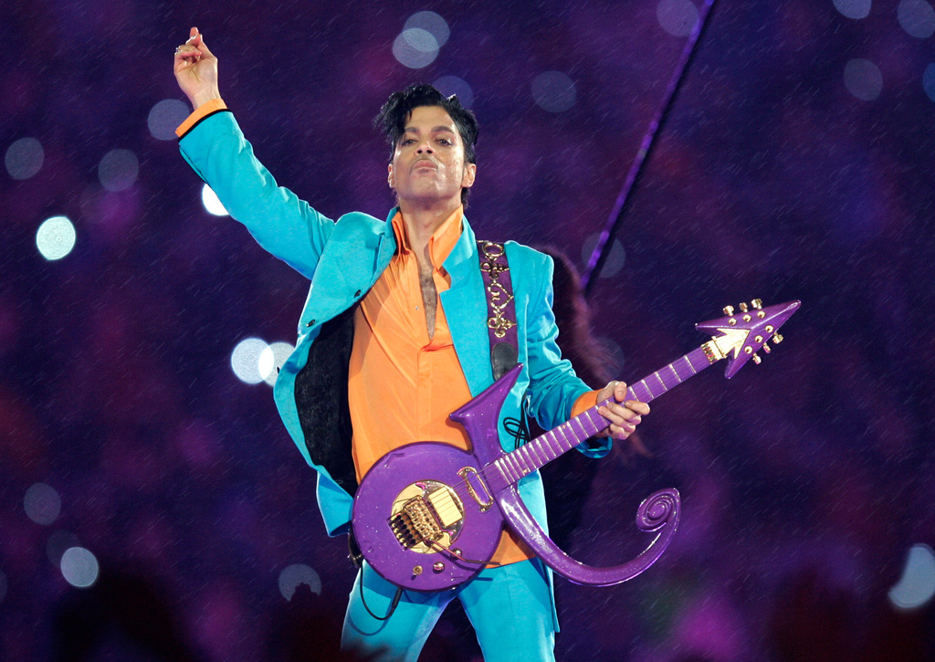 FILE - Prince performs during the halftime show at the Super Bowl XLI football game in Miami on Feb. 4, 2007. (AP Photo/Chris O'Meara, File)