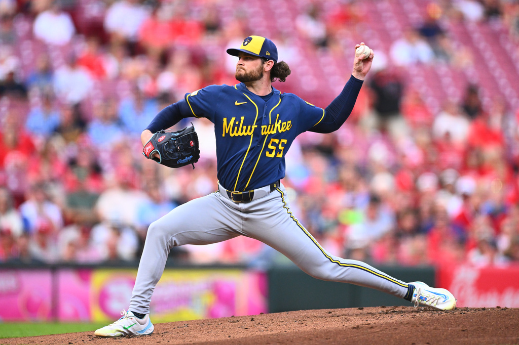 Milwaukee Brewers pitcher Shane Drohan throws during the first inning of a baseball game against the Cincinnati Reds in Cincinnati, Wednesday, June 24, 2026. (AP Photo/Ben Jackson)