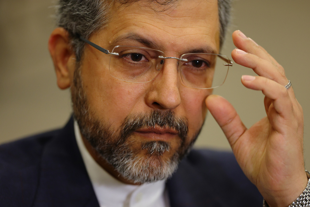 Iran's Deputy Foreign Minister Saeed Khatibzadeh adjusts his glasses as he talks during an interview with Associated Press at the Antalya Diplomacy Forum, in Antalya, southern Turkey, Saturday, April 18, 2026. (AP Photo/Riza Ozel)