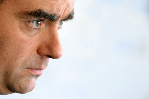 Reappointed French Prime Minister Sebastien Lecornu looks on as he visits a police station in L'Hay-les-Roses, outside Paris, Saturday, Oct. 11, 2025. (Martin Lelievre, Pool Photo via AP) Reappointed French Prime Minister Sebastien Lecornu looks on as he visits a police station in L'Hay-les-Roses, outside Paris, Saturday, Oct. 11, 2025. (Martin Lelievre, Pool Photo via AP)