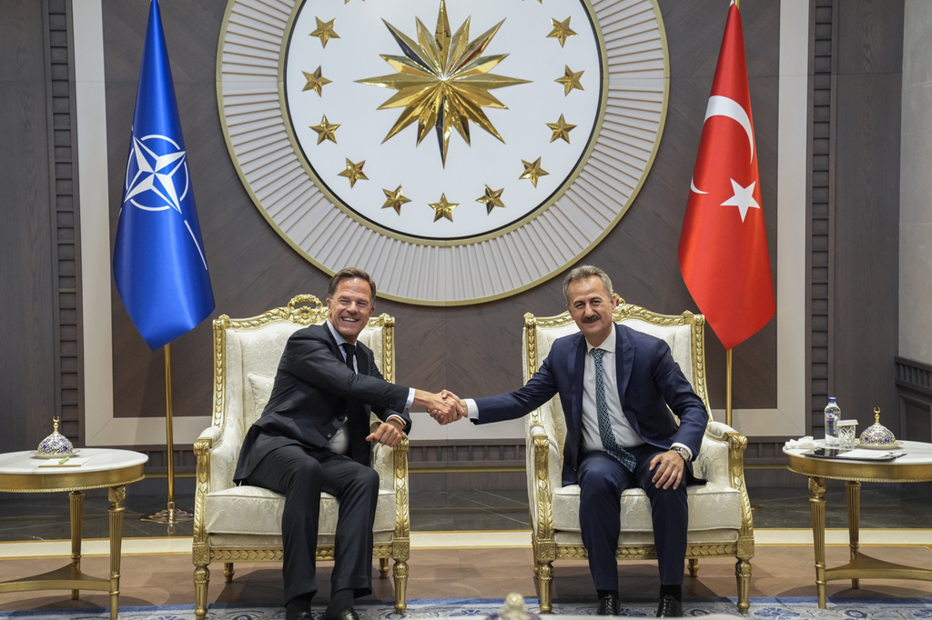 NATO Secretary General Mark Rutte, left, meets with Turkish Presidential Defense Industries Directorate Haluk Gorgun as he arrives ahead of the NATO Summit in Ankara, Turkey, Monday, July 6, 2026. (Osmancan Gürdoğan, Pool Photo via AP)