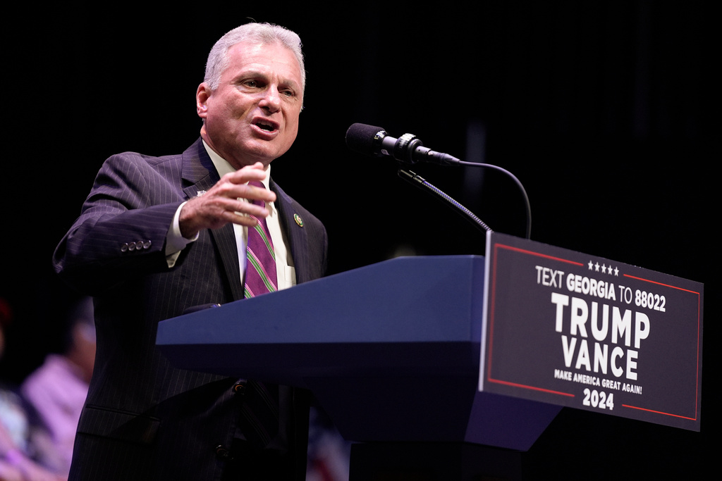 FILE - Rep. Buddy Carter, R-Ga., speaks before Republican presidential candidate former President Donald Trump arrives to deliver remarks on the tax code, and manufacturing at the Johnny Mercer Theatre Civic Center, Sept. 24, 2024, in Savannah, Ga. (AP Photo/Evan Vucci, File)